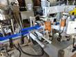 Etiquetadora autom�tica para botellas y tarros cil�ndricos planos Maqmundi
