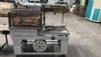Selladora autom�tica en L con t�nel de retracci�n.