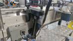 Etiquetadora autom�tica de doble cabezal para botellas planas Bauch Campos