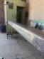 Llenadora rotativa gravimtrica de acero inoxidable con cabina