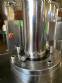 Llenadora rotativa gravim�trica de acero inoxidable con cabina