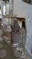 M�quina rotativa de acero inoxidable para llenado, dosificaci�n y sellado, con junta de aluminio, para tarros, vasos y botellas Delgo.