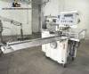 M�quina autom�tica de envoltura de celof�n Flow Mack V3, 45 unidades por minuto.