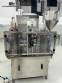 Llenadora dosificadora volum�trica con selladora y taponadora en acero inoxidable Delgo 2000 botes por hora